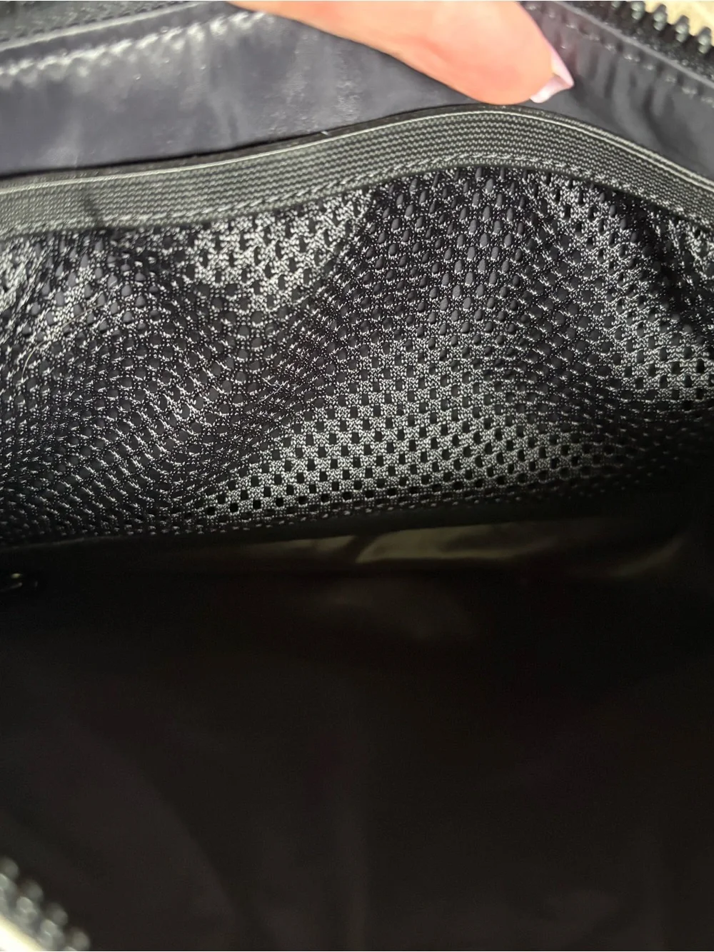 white and black Caraa x Athleta crossbody bag